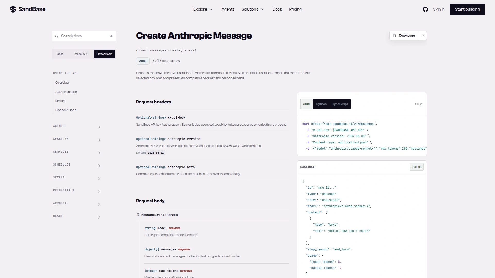 SandBase docs page Create Anthropic Message showing POST /v1/messages, the x-api-key, anthropic-version and anthropic-beta headers, and a cURL example